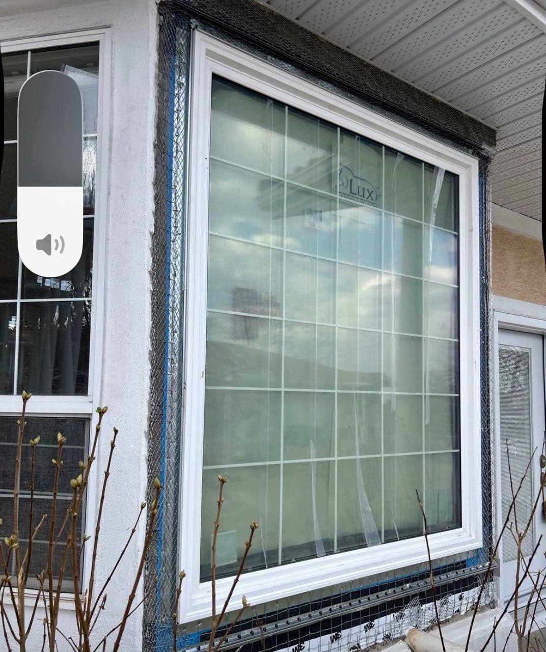 Energy efficient window installation Calgary stucco home insulation
