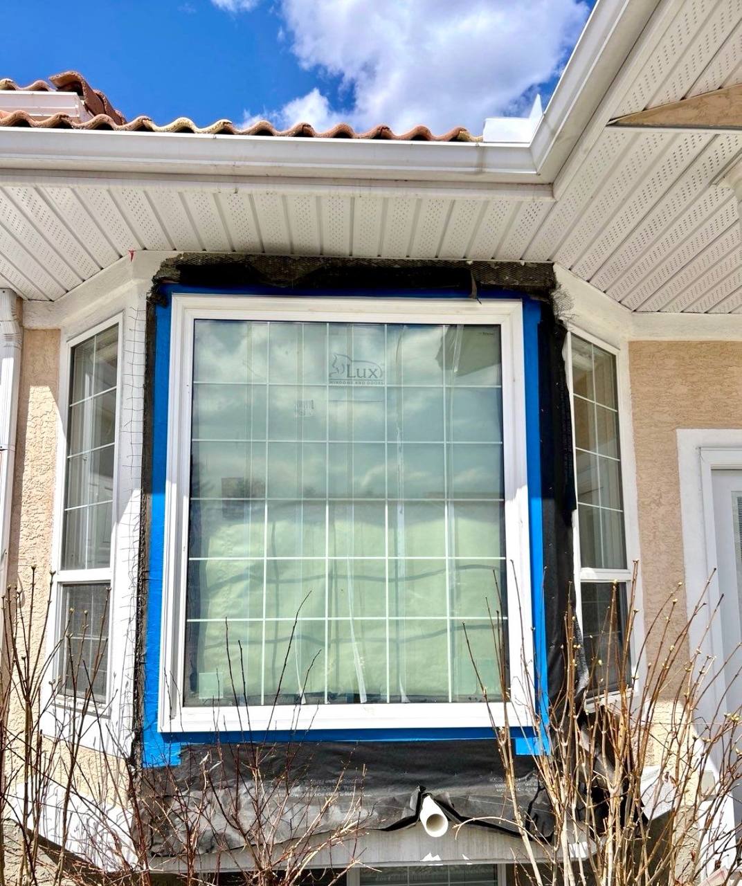 Calgary stucco contractor High End Construction window project