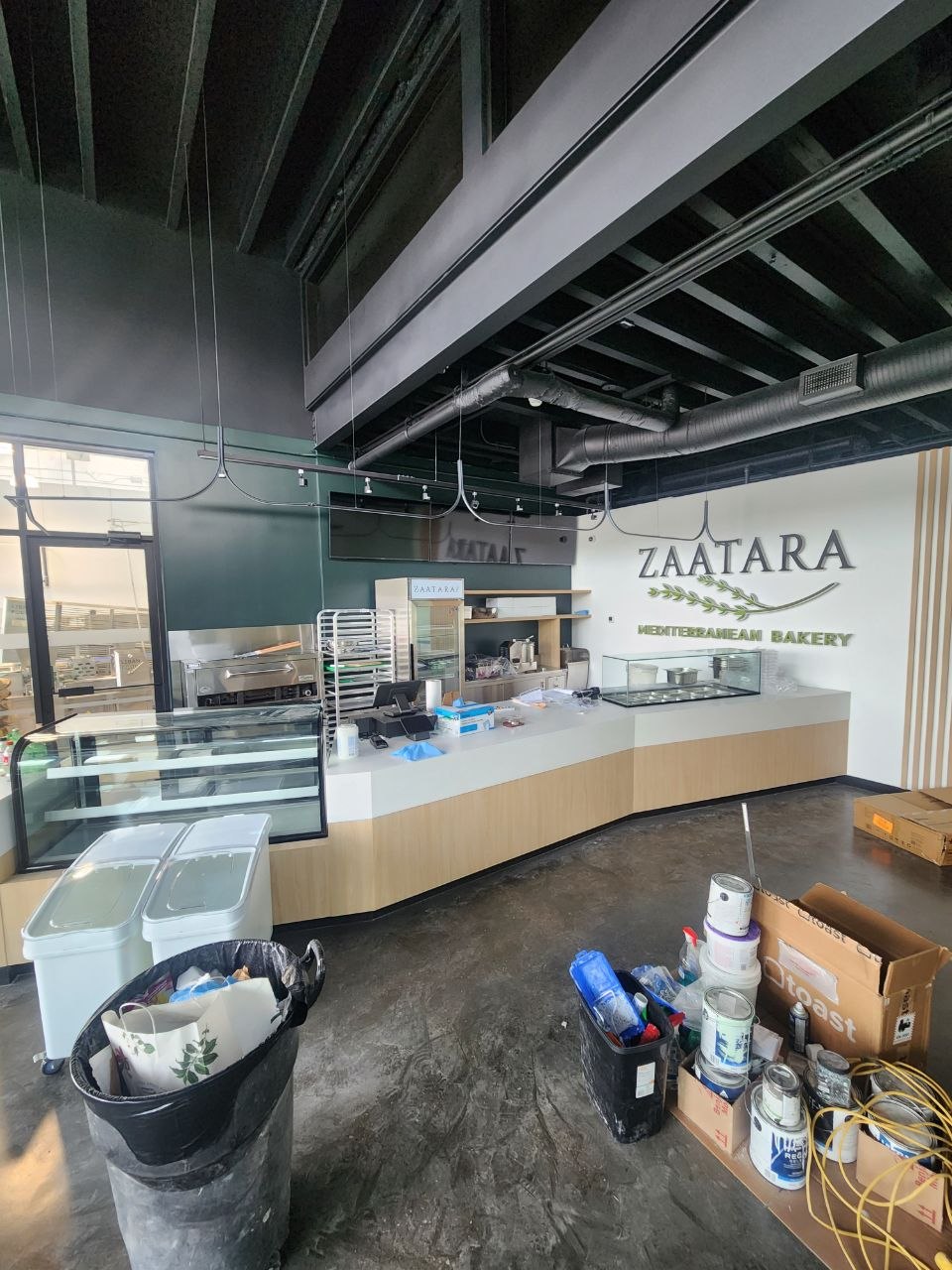 Zaatara Mediterranean Bakery Calgary storefront and front counter during final fit-out
