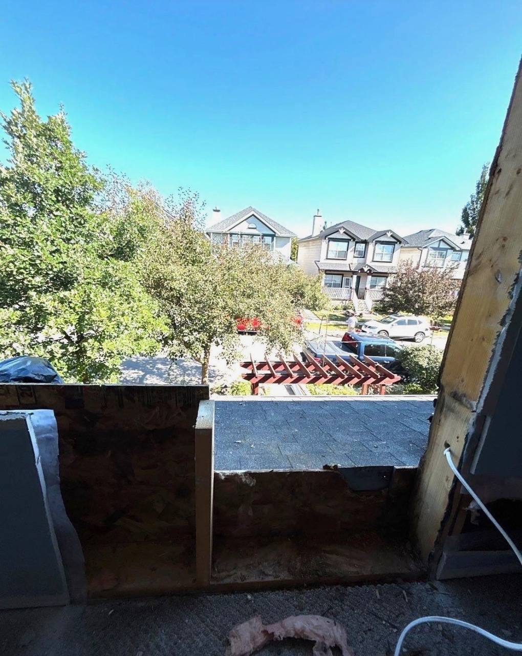 Interior view through a window opening during the project